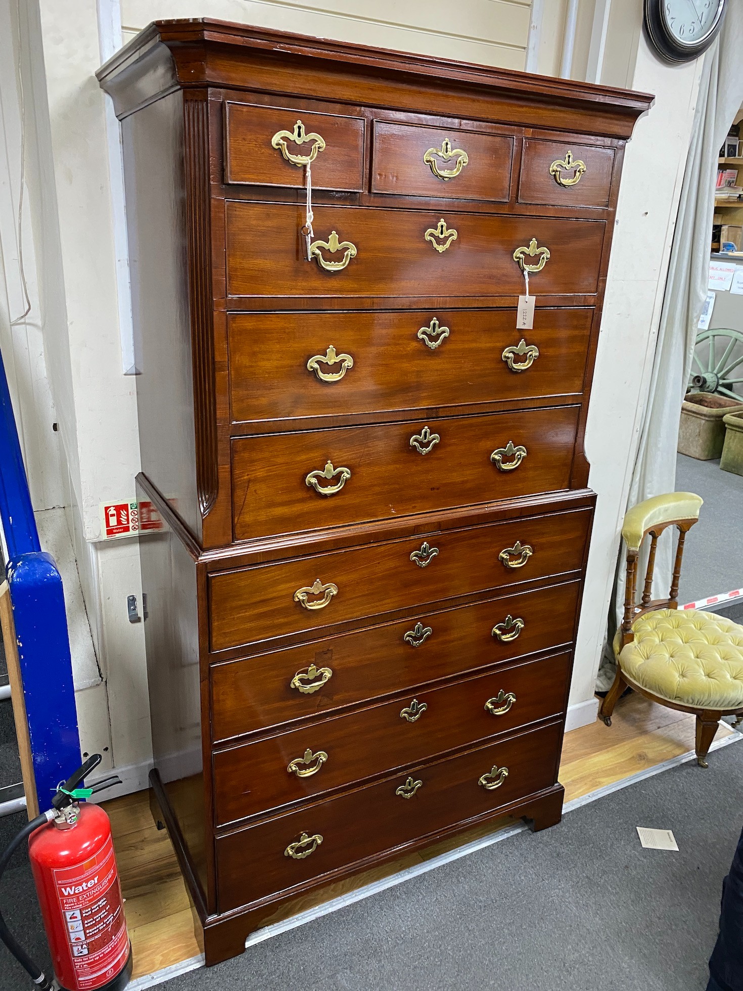 A George III mahogany chest on chest, with later secretaire drawer, width 105cm, depth 56cm, height 194cm